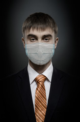 portrait businessman in medical mask