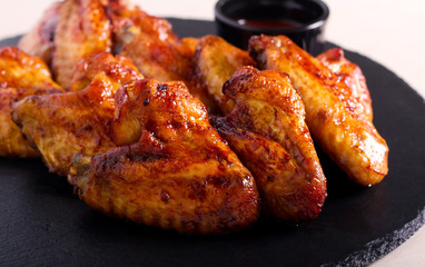 Roast glazed chicken wings served