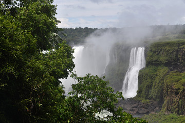 Fototapeta na wymiar raging waterfall and mountain river in the jungle