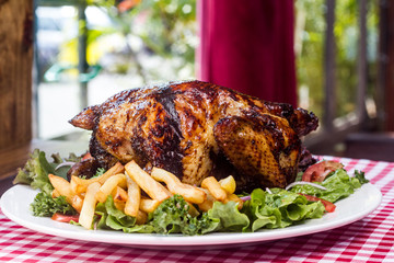 Salad,  roasted chicken and french fries