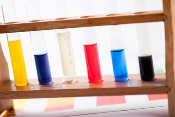 Blood tests and charts representing coronavirus spreading