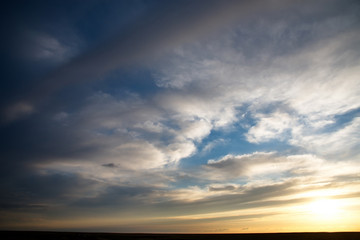 Russia. Western Siberia. Panorama of the evening sky over the fields near the city of Omsk.