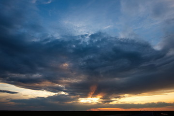 Russia. Western Siberia. Panorama of the evening sky over the fields near the city of Omsk.