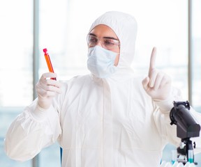 Male chemist working in lab