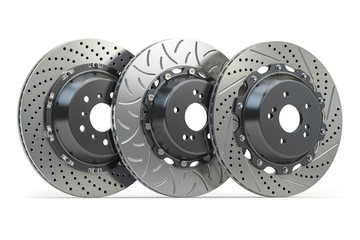 Different types of brake disks. Drilled and slotted brake disks in a row. - obrazy, fototapety, plakaty