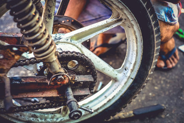 Maintenance and change of motorcycle rear wheel brake systems