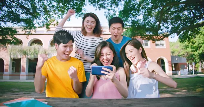 Friends play games on smartphone