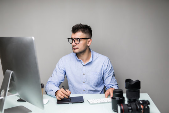 Young Man Photographer Editing Home Office Concept