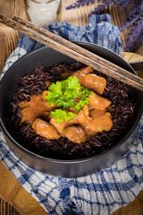 Thai red curry with chicken and black rice.