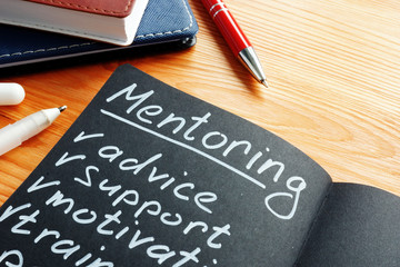 Mentoring with mentor list advice, support and motivation in the notepad. - obrazy, fototapety, plakaty