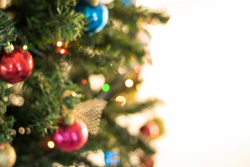 Obraz na płótnie Canvas Defocused christmas background. Christimas tree, decoration and lights 
