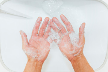 Fototapeta premium Washing hands rubbing with soap man for corona virus prevention, hygiene to stop spreading coronavirus.