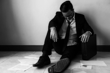 Sad unemployed businessman due to covid-19