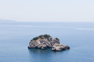 Naklejka premium Lonely island in the sea 
