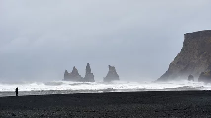 rocks in the rough sea in iceland vik © Guenter