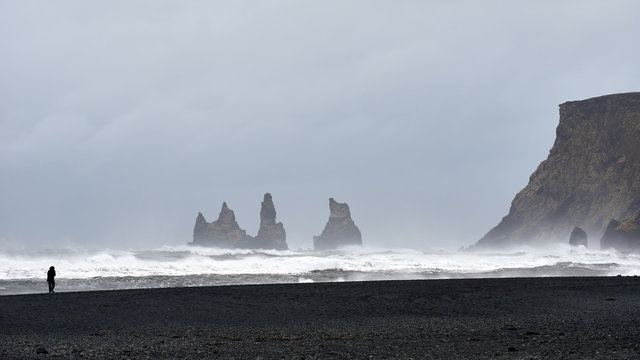 rocks in the rough sea in iceland vik