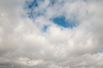 the sky is blue with white clouds