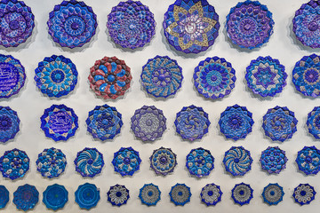 Persian plates for sale on the Grand Bazaar also called Qeysarriyeh or Soltani bazaar in Isfahan...