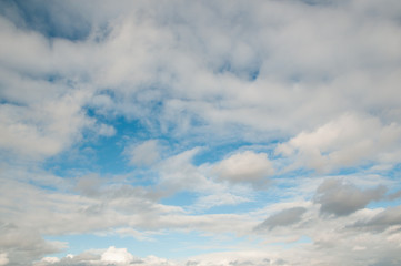 the sky is blue with white clouds
