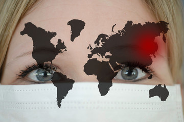 woman wears a protective mask. Above it is a world map with China marked in red