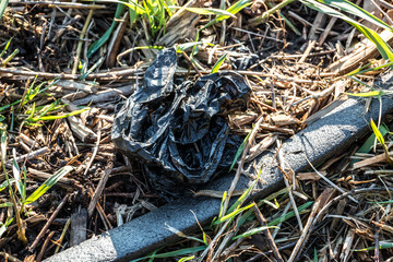 Plastic waste thrown away in the middle of nature