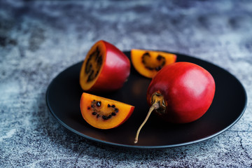 Ripe Tamarillo fruit with slices