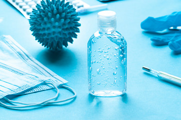 Antibacterial transparent hand sanitizer gel in a plastic bottle. Coronavirus (Covid-19) preventive measures top view concept  - obrazy, fototapety, plakaty