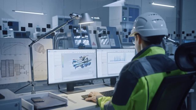 In Factory: Professionals Working on CNC Machinery Walk Through Workshop, Use Digital Tablet Manipulate Robot Arm Production Line. In-Office: Male Engineer Controls System with Computer. Moving Camera