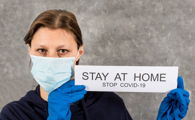 Woman holding poster with 