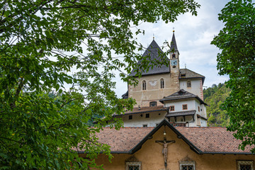 Fototapeta na wymiar Sanctuary of San Romedio dedicated to Saint Romedius situated on a steep rocky spur in the natural scenery of the Val di Non, Trentino, Italy  