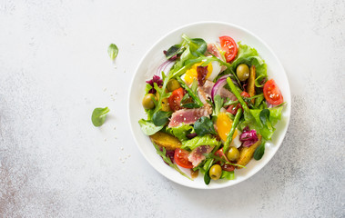 Fresh vegetables, tuna, eggs  and baked potatoes salad