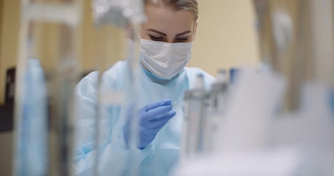 scientist working on virus cure at laboratory
