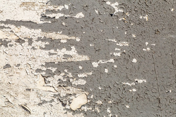 Old paint background. Texture and pattern of peeling dried old paint on the wall. Old painted wall background