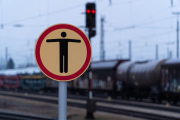 Danger and Stop sign on a train station