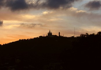 The silhouette of a fairytale castle on top of a mountain...