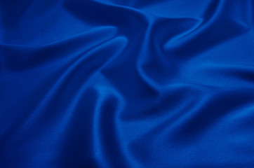 Blue satin or silk fabric as background