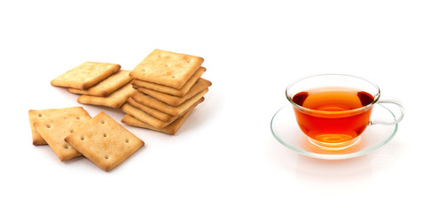 Cup of tea and cookies isolated on white