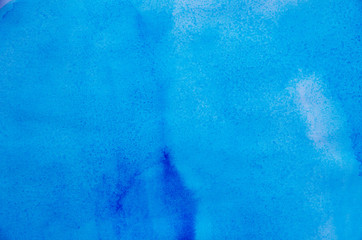 Hand painted blue watercolor background.