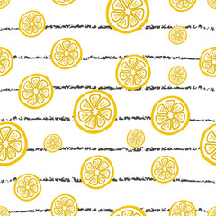 Seamless vector hand drawn pattern with lemon slices on the vertical striped background. It can be use for fabric, packaging, labels, wrapping paper or background of something else.