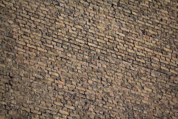 Old brick wall in a backgroun. Texture