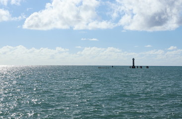 Fototapeta na wymiar Sea and lighthouse of Ponta Verde beach, Maceio city, Alagoas state, Brazil.