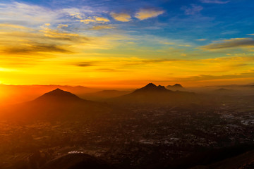 Fototapeta na wymiar View of Valley, Mountain Peaks at Sunset 