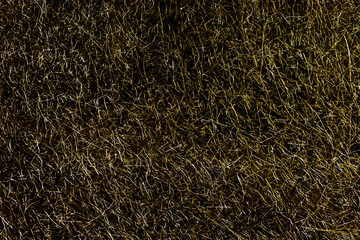 Abstract gold plastic fibre sheet background, texture or surface