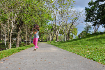 coronavirus young girl walk pathway holding sanitizer run scared help covid19