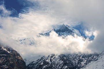 Machapuchare, Machhapuchchhre or Machhapuchhre Mountain Peak, also known as Fish Tail, Obscured by Clouds in Nepal Himalayas on Annapurna Base Camp Hiking or Trekking Route