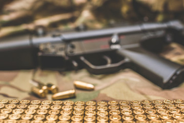 MP5, bullets and multicam