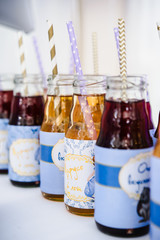 Little girl birthday party table with princess cake, macaroons, cupcakes, and sugar cookies. Candy bar for kids. Sweet holiday buffet with sweets and other desserts.