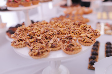 Candy bar on wedding. Sweets and decerts in restairant