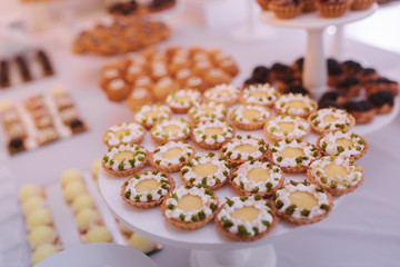 Candy bar on wedding. Sweets and decerts in restairant