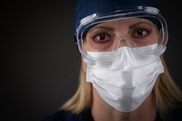 Fototapeta na wymiar Female Medical Worker Wearing Protective Gear Showing Symptoms of Disease
